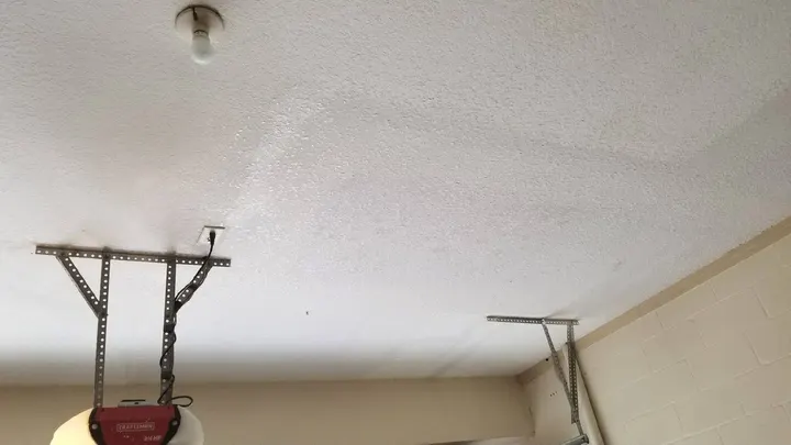 Same garage with a new textured drywall ceiling