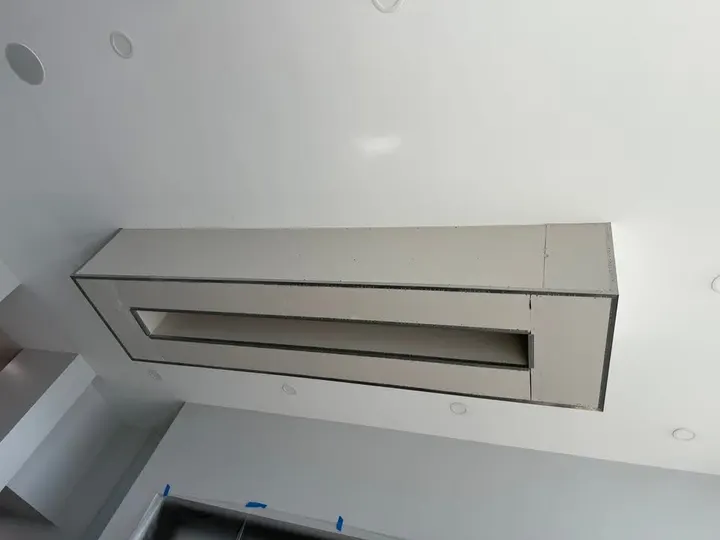Finished floating drywall bulkhead with recessed opening