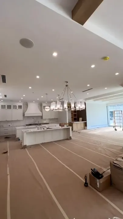 Finished drywall and ceilings in a luxury kitchen with recessed lights