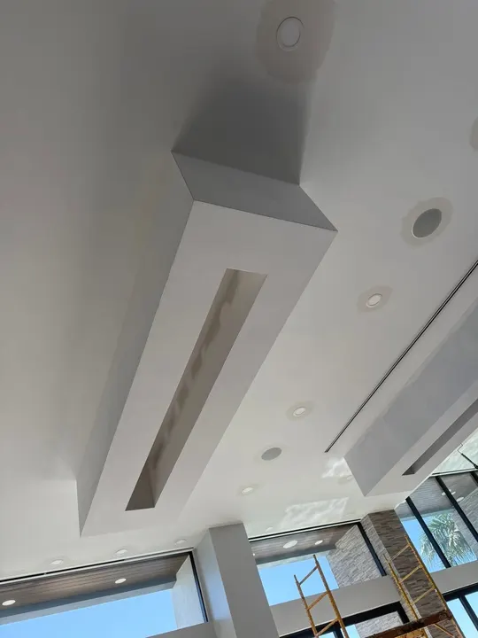 Modern drywall ceiling soffit with a recessed linear light channel