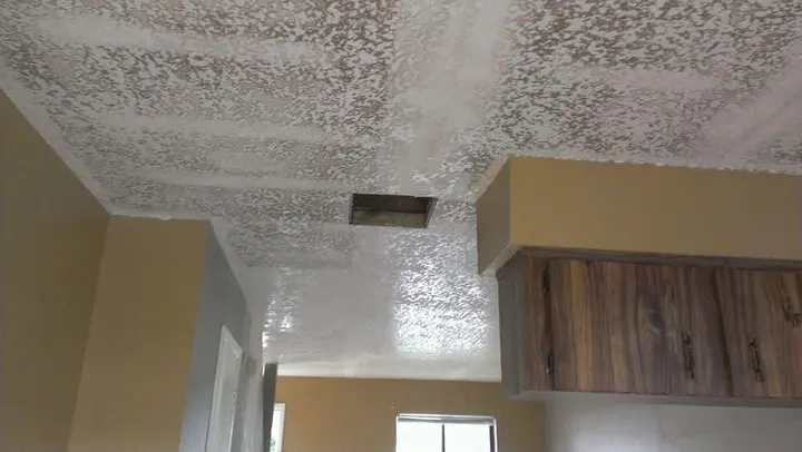 Texture & Finishing — Popcorn ceiling removal and new texture in progress over a kitchen